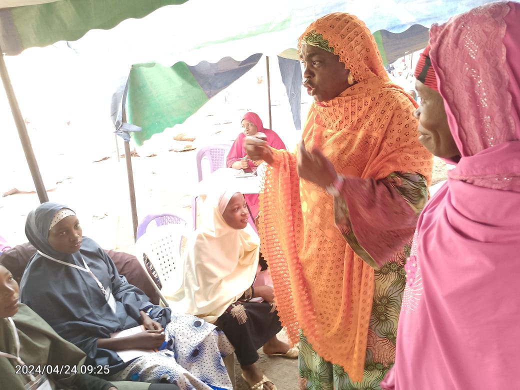 Life coaching session under community canopy